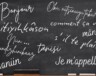 Tableau avec inscriptions en français et différentes langues autochtones. &mdash; Crédits : Canva