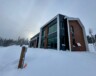 Le nouveau bâtiment de biathlon a été inauguré le 16 février 2026 à Whitehorse. &mdash; Photo Nelly Guidici
