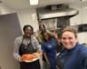 Équipe ACFA Régionale d’Edmonton, de gauche à droite : Doris Kamdem (bénévole), Amba Twita (bénévole), Raissa Kenfack (employée) et Josée Côté (Directrice)  