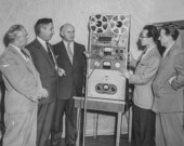Edmonton Radio Station CHFA, [1960s], J. M. Fontaine, L. P. Mousseau, A. M. Déchène, Jacques Boucher (directeur de la programmation), et B. J. Gagnon reçoivent un appareil d’enregistrement de SSJB, Montréal

 &mdash; CRÉDIT: Provincial Archives of Alberta, A6503