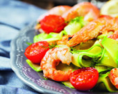 Prawns, zuchini noodles and tomato - delicious healthy food  