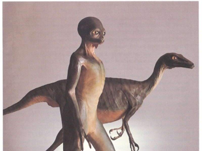 Représentation d'artiste du fictif dinosauroïde, au premier plan, et de son plus proche authentique cousin. &mdash; Photo : Musée canadien de la nature