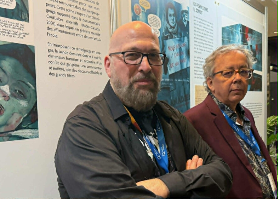 Christian Quesnel et Jacques Poirier à la bibliothèque de l’UdeH pour la présentation de la bande dessinée. &mdash; Photo de courtoisie