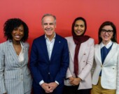 Le premier ministre est entouré de ses trois candidates victorieuses : Tatiana Auguste, Doly Begum et Danielle Martin.  &mdash; Photo : Mark Carney/Facebook