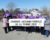 Les participantes de JIF avec leur bannière à Pubnico-Ouest. &mdash; Norbert LeBlanc