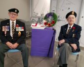 Les vétérans de guerre Raymond Chiasson et feu Louis Joseph Maillet lors d’une campagne de coquelicots à la NSLC de Chéticamp en 2019.   &mdash; Neil Poirier