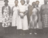 Groupe de femmes (et un homme) vêtues d’une toge de choriste, à l’Église baptiste Emmanuel, Upper Hammonds Plains. &mdash; PHOTO: C.R. Brookbank, Nova Scotia Archives