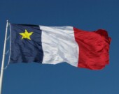 Le drapeau acadien. &mdash; PHOTO: Facebook - Parc national Kouchibouguac, Parcs Canada